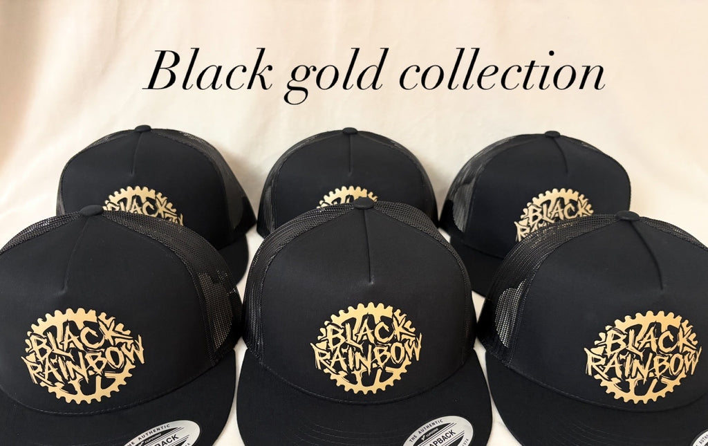 Trucker Hat - flat brim - snap back - Black with Gold logo